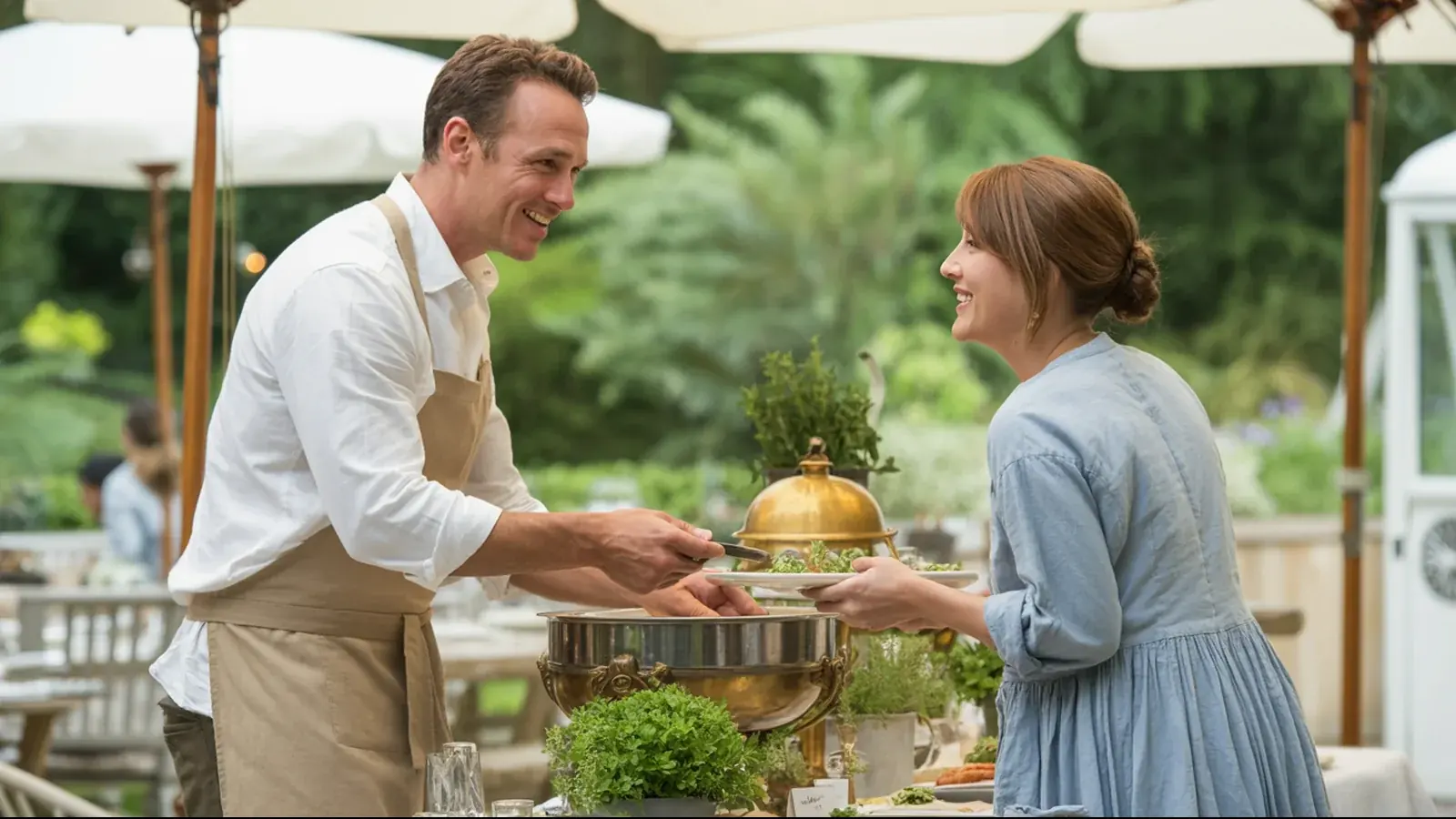 The owner of a catering business at work with a customer, in a bright real moment