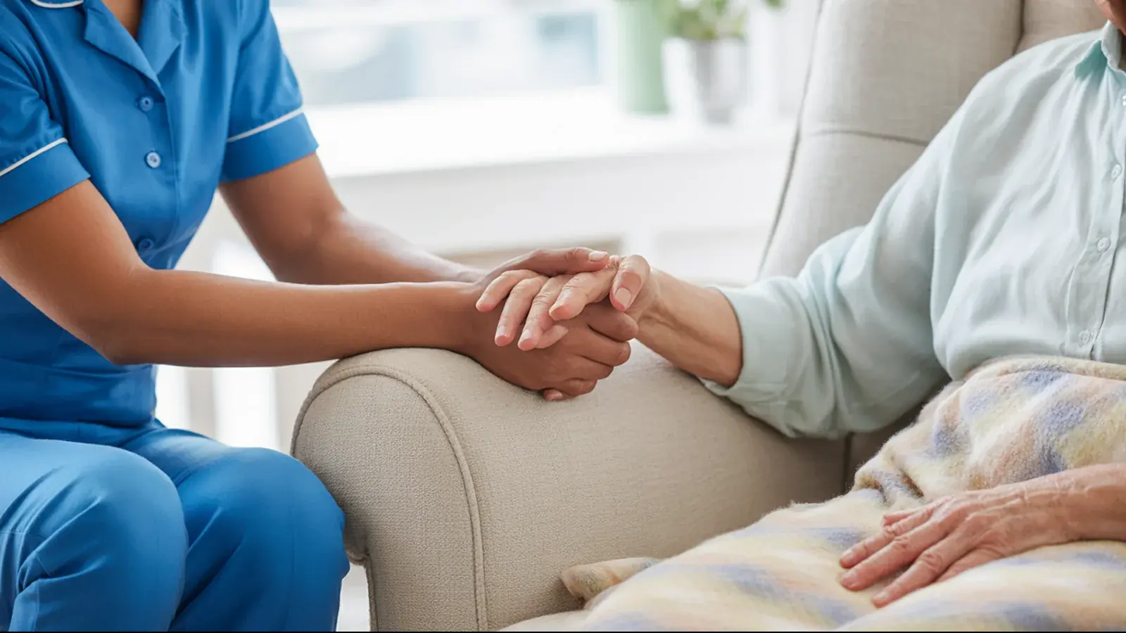 The owner of a home care agency at work with a customer, in a bright real moment